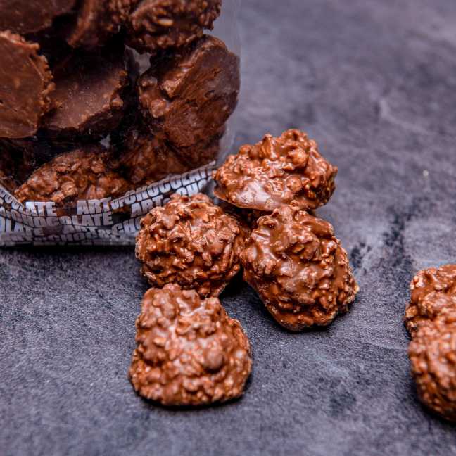 Kousky kokosu v luxusní mléčné čokoládě 150 g